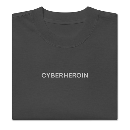 Folded view of NECROBLEND’s oversized unisex T-shirt — formula-x from The Unspoken capsule in graphite. Silent imprint referencing digital withdrawal.