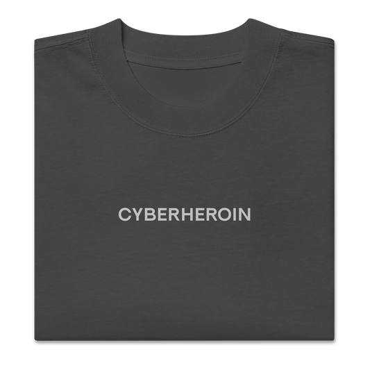 Folded view of NECROBLEND’s oversized unisex T-shirt — formula-x from The Unspoken capsule in graphite. Silent imprint referencing digital withdrawal.