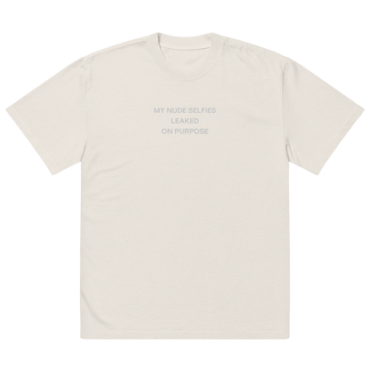 Oversized unisex T-shirt by NECROBLEND — self-disclosure unit from The Unspoken capsule, front view in faded bone. Speculative apparel piece echoing the aesthetics of exposure.