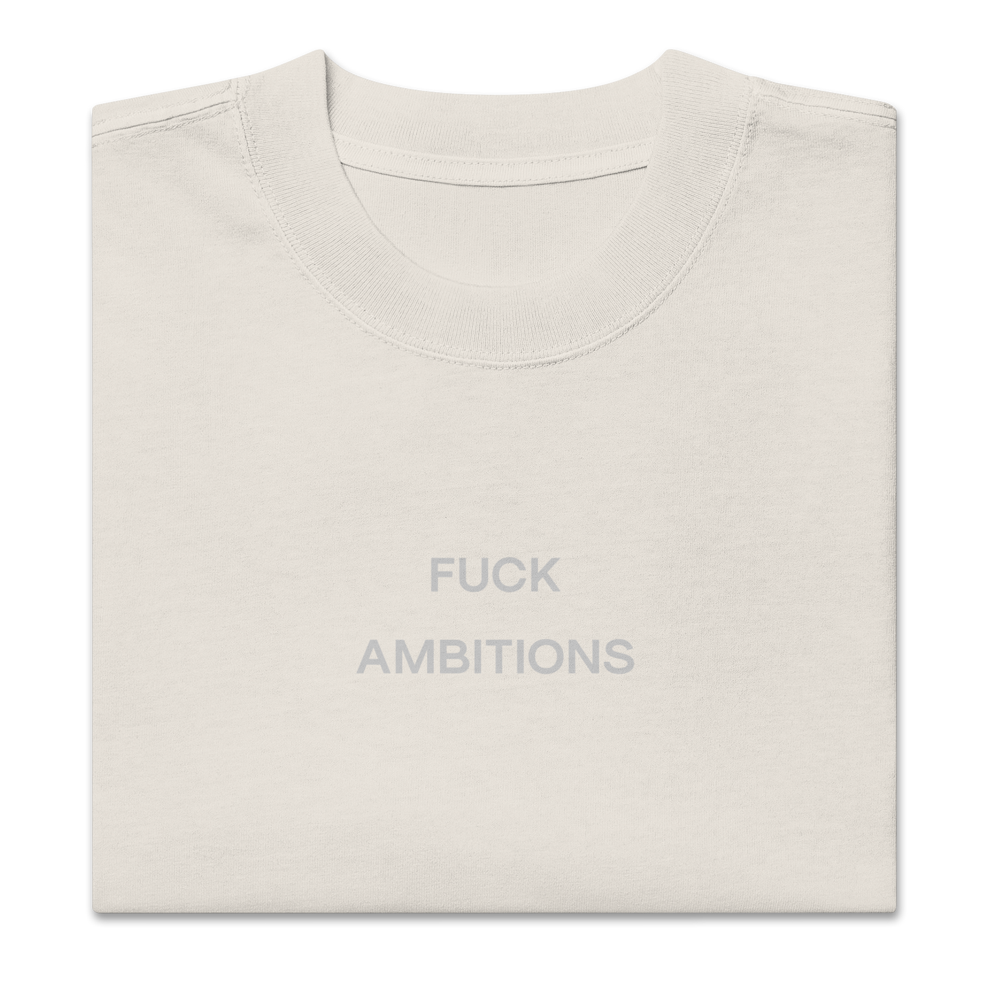 Folded view of NECROBLEND’s oversized unisex T-shirt — unspoken symptom in faded bone. A softshell for resistance, printed as speculative apparel.